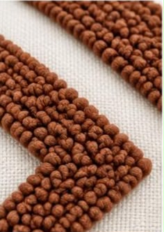 Coussin Brodé Tribal